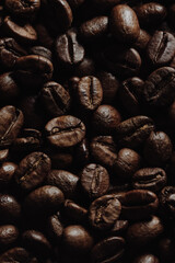 Coffee beans close up, roasted coffee, organic drink ingredient