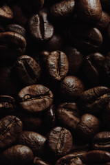 Coffee beans close up, roasted coffee, organic drink ingredient