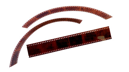 A transparent brown negative film roll with a perforated frame typical of analog cameras, with a transparent background.