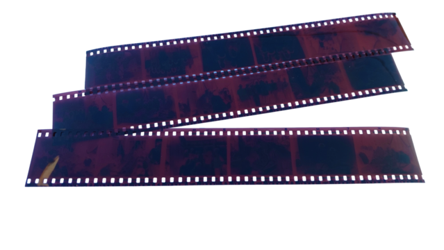 A transparent brown negative film roll with a perforated frame typical of analog cameras, with a transparent background.