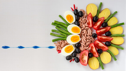 Fototapeta premium Creative arrangement of fresh ingredients resembling a fish
