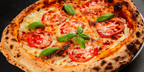 Pizza tomato margarita fast food natural product tasty snack fresh delicious gourmet food background on the table rustic top view copy space