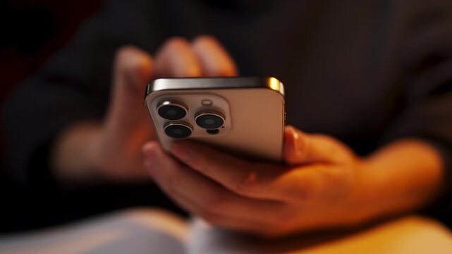 Female texting on smartphone, scrolling and zooming photos in social media app