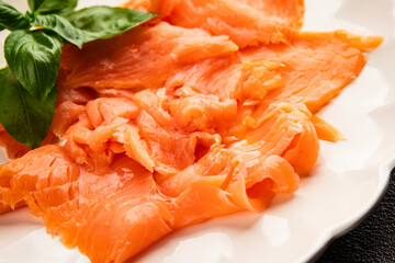 Smoked salmon fish seafood portion size natural product tasty snack fresh delicious gourmet food background on the table rustic top view copy space pescetarian diet