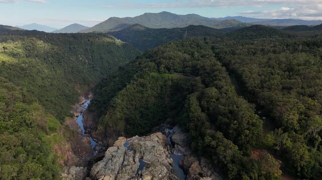 Barron Gorge National Park, Kuranda, Queensland, Australia &ndash; 4K Aerial Drone Footage of Barron Falls, Lush Rainforest, Skyrail Gondola, Kuranda Train, and Scenic Cairns Hinterland Landscape