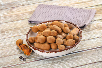 Tropical exotic Tamarind fruit heap