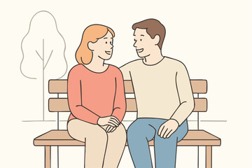 Couple sitting on park bench