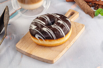Delicous sweet donut with chocolate glaze