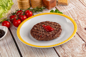 Grilled juicy beef cutlet for burger