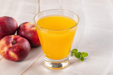 Vitamin beverage - peach juice glass