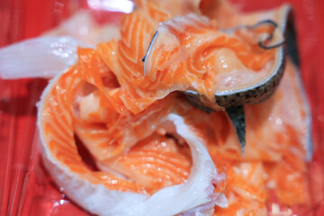 Salmon scraps left over from trimming, Salmon scraps, Salmon trimmings,  skin scraps.