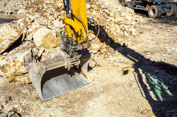 Excavator bucket on construction site