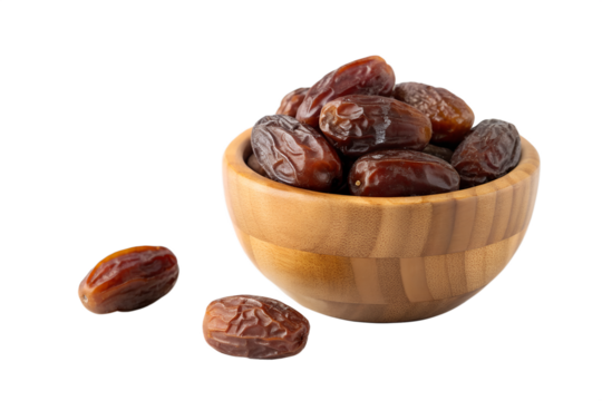 Wooden bowl overflowing with fresh dates