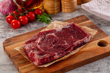 Gourmet raw rib eye steak