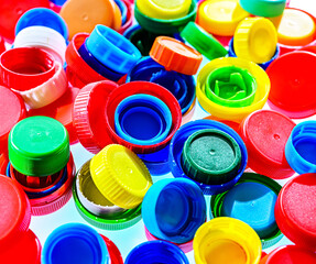 Different sorts of colorful plastic bottle caps. Recycling