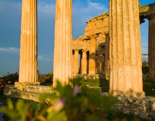 Ancient columns bathed in golden light
