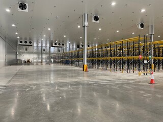 brand new chiller in large warehouse facility with polished concrete floor