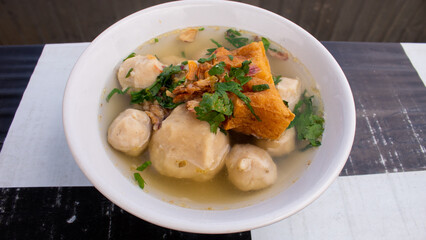 Indonesian Meatball Soup Bakso with Tofu and Fried Shallots