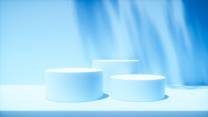 Simple cylindrical podiums in different sizes against a bright blue wall. Soft shadows from a plant add a touch of nature, creating a minimalist product display.