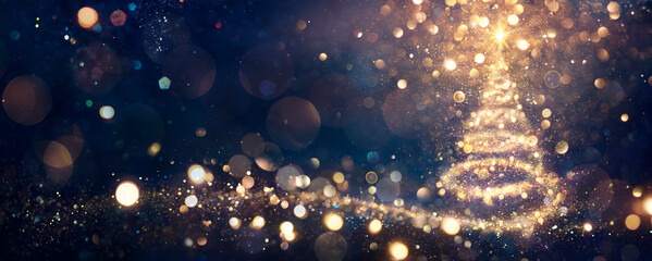 Fototapeta na wymiar Christmas Tree In Shiny Night - Golden Glittering In Abstract Blue Background