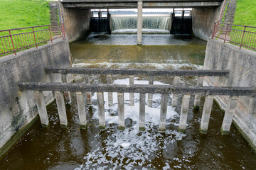  Concrete Dam with Flowing Water