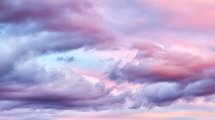 Obraz premium A breathtaking view of a pastel sky with soft clouds, blending shades of pink, purple, and blue