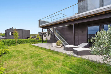 Modern villa exterior in minimal scandinavian style, 3d rendering