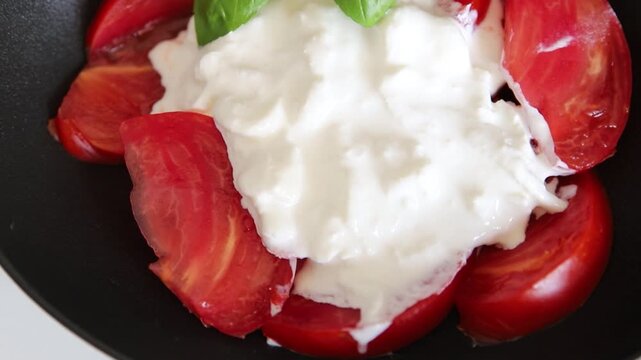 Salad strachatella and tomato portion size natural product tasty snack fresh delicious gourmet food background on the table rustic top view copy space keto and paleo diet