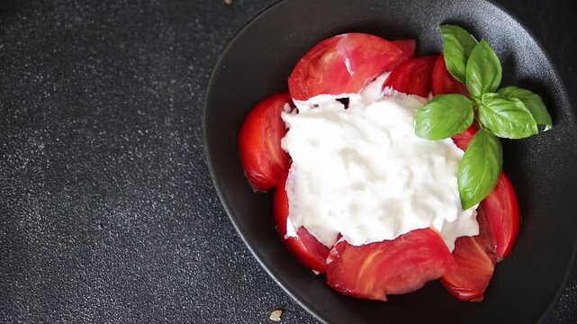 Salad strachatella and tomato portion size natural product tasty snack fresh delicious gourmet food background on the table rustic top view copy space keto and paleo diet