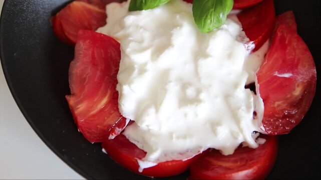 Salad strachatella and tomato portion size natural product tasty snack fresh delicious gourmet food background on the table rustic top view copy space keto and paleo diet