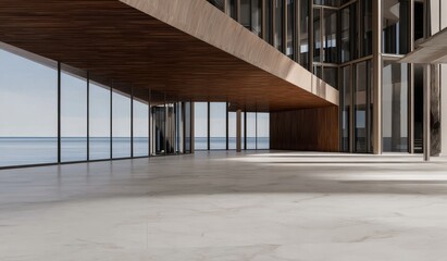 Modern architectural structure with large glass windows overlooking a calm sea