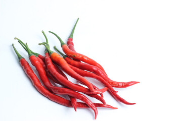 bunch of fresh hot chilies isolated on white background. In Indonesia it is usually called Cabai Merah Keritng. The main ingredient in every spicy dish or dish, for example chili sauce
