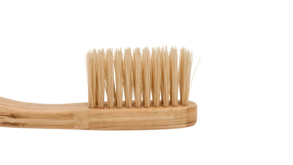 Ecofriendly bamboo toothbrush with natural bristles on the transparent background for sustainable oral care and zero waste lifestyle