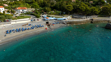 Aerial view of a beach club in Fiumicello beach, located in Maratea. It is a popular seaside resort overlooking the Mediterranean Sea in the province of Potenza, Basilicata, Italy.