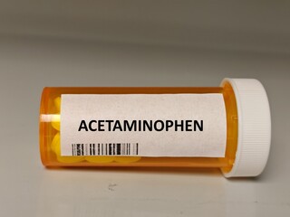 ACETAMINOPHEN box of tablets on hospital pharmacy table, used to relieve mild to moderate pain and...