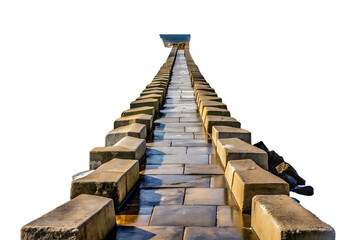 Stone walkway leading to water with dark background pathway isolated on a transparent background