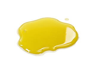 Golden olive oil spill on black background for culinary cooking and healthy Mediterranean diet