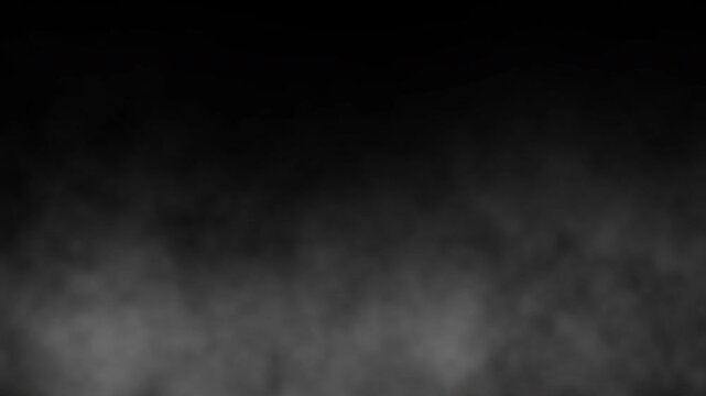 Moving smoke or fog effect isolated on black screen background. Slow motion of mist, Loopable smoke steam. Animated loop fog or transparent smoke for overlay, video editing, 4K video