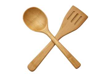 Eco-friendly wooden kitchen utensils set spoon spatula crossover cooking essentials black background