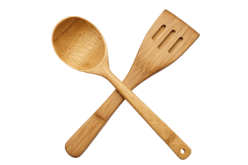 Eco-friendly bamboo kitchen utensils crossed on black background for cooking enthusiasts image