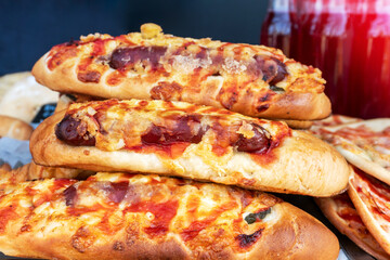 Toasted bread with sausage and tomato sauce, hot baked goods with crispy crust