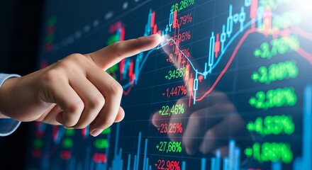 Hand pointing at a glowing stock market trading chart with uptrend and downtrend lines