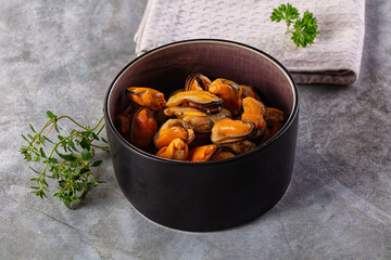 Peeled mussels heap in the bowl