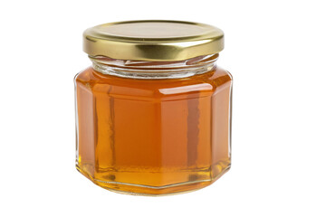 Pure natural honey in hexagon glass jar with gold lid isolated on plain white background image