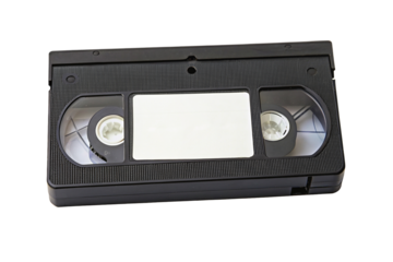 Vintage vhs cassette tape on black background symbolizing retro media and nostalgia in media culture