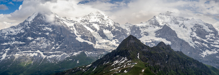 Eiger, Monch and Jungfrau peaks from Manlinchen, Switzerland
