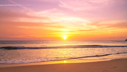 Obraz premium Vibrant sunset over a beach