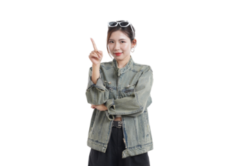 Confident Pointing: A stylish young woman with sunglasses atop her head confidently points her index finger upwards, symbolizing insight and instruction.
