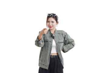 Trendy Woman's Confident Gesture: A stylish young woman with trendy sunglasses confidently points directly at the viewer, projecting an aura of assertion and charm.