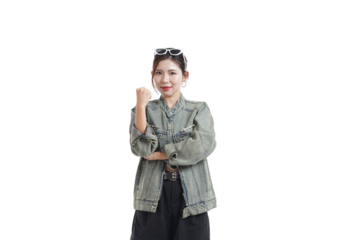 Radiant Confidence: A young woman exudes self-assurance with a captivating smile, her body language communicating strength and composure, portraying modern fashion, standing on a plain background.